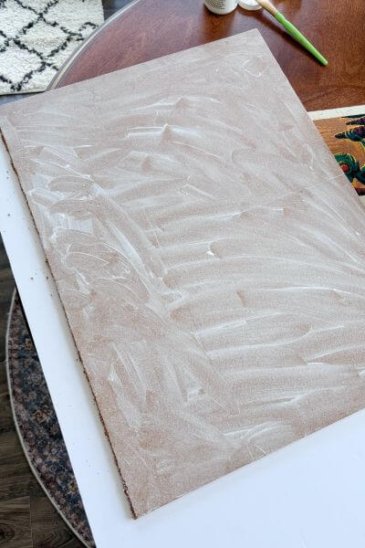 Mod podge completely covering cork.