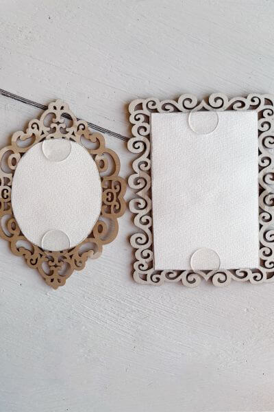 Glue dots on a circular and square frame.
