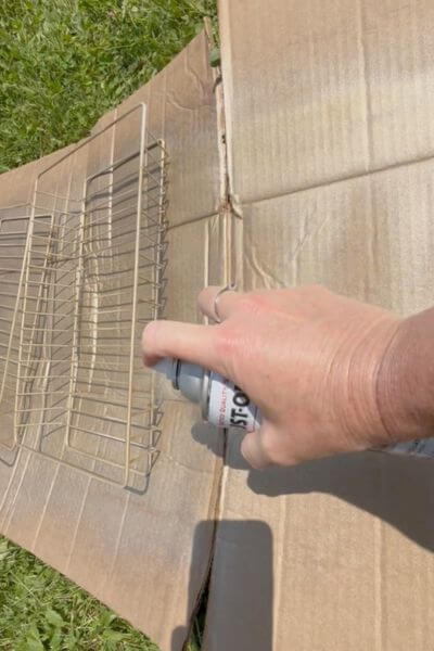 Spray paint the baskets of the wire cart.