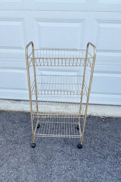 Wire plant stand painted gold and assembled.